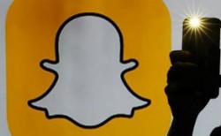 企业出海 - Snapchat在媒体版块插播广告 强制 用户观看